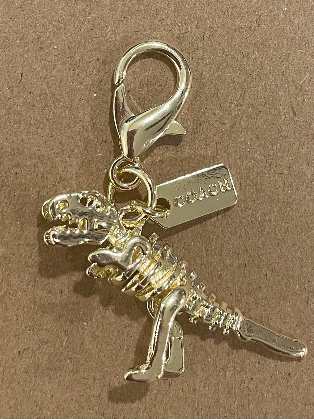 Coach Gold Dinosaur Skeleton Charm with Lobster Clasp